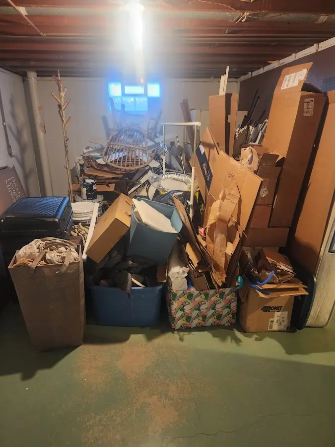 Roll-off dumpster container at job site for Yard Waste Dumpster Rental in Moose Lake